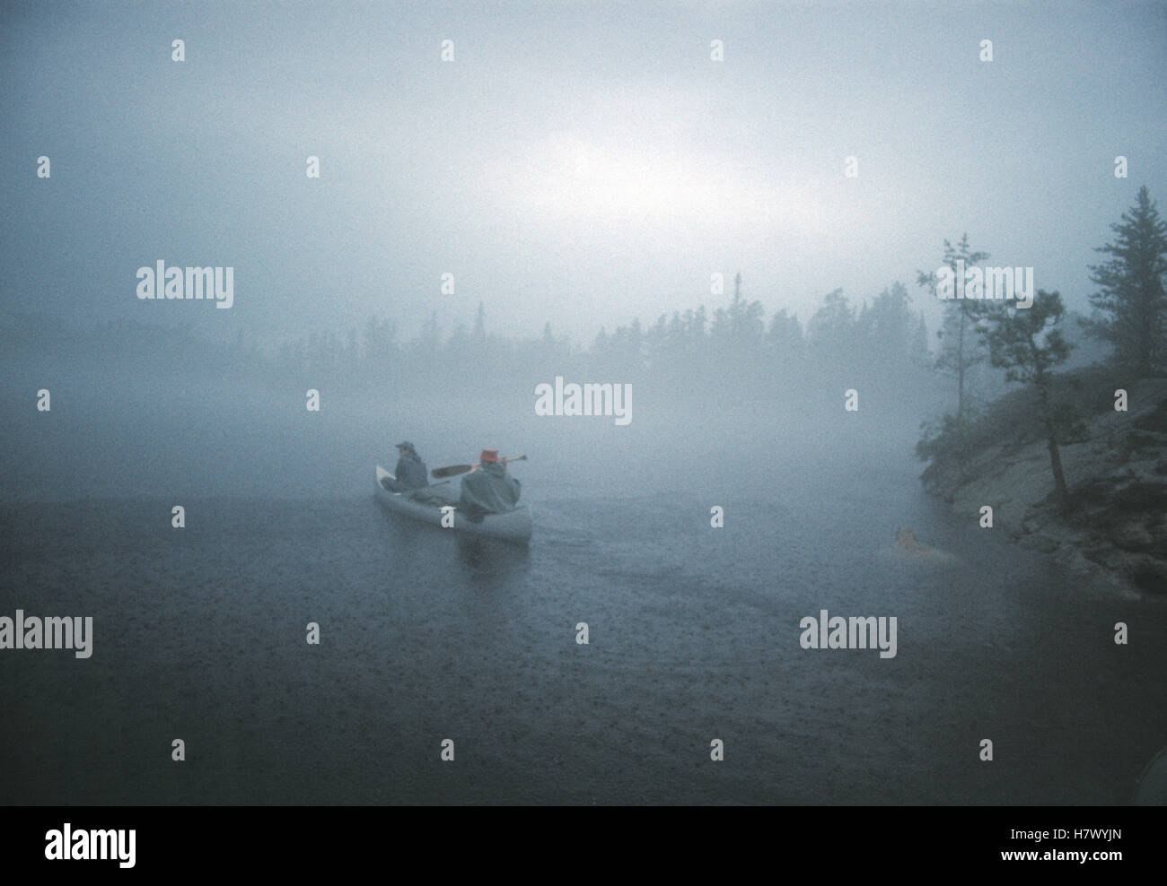 Canoeing in the rain, Boundary Waters Canoe Area Wilderness, Minnesota