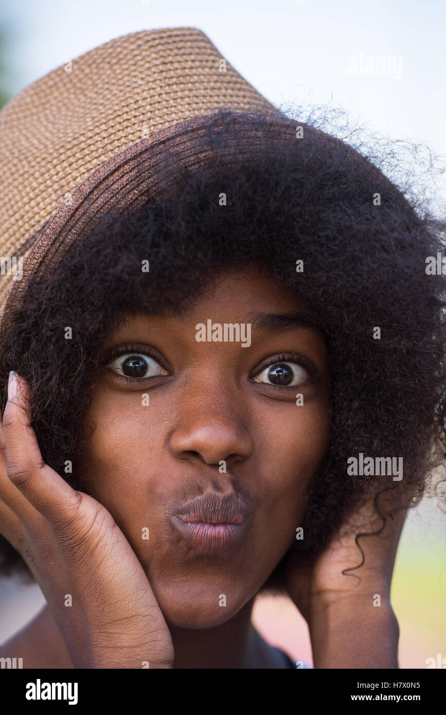 Close up portrait of a beautiful young african american woman smiling ...