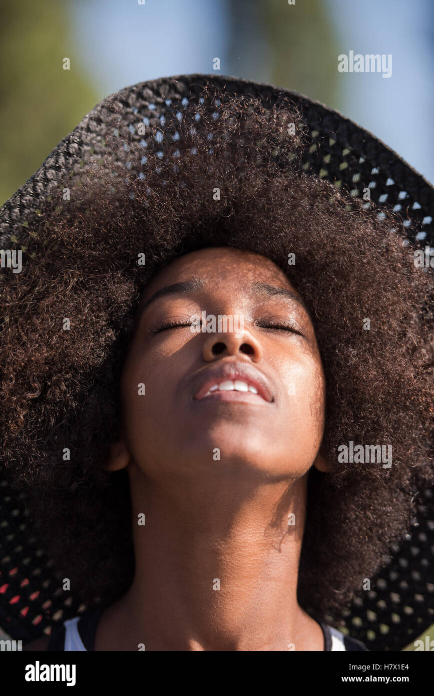 Close up portrait of a beautiful young african american woman smiling ...