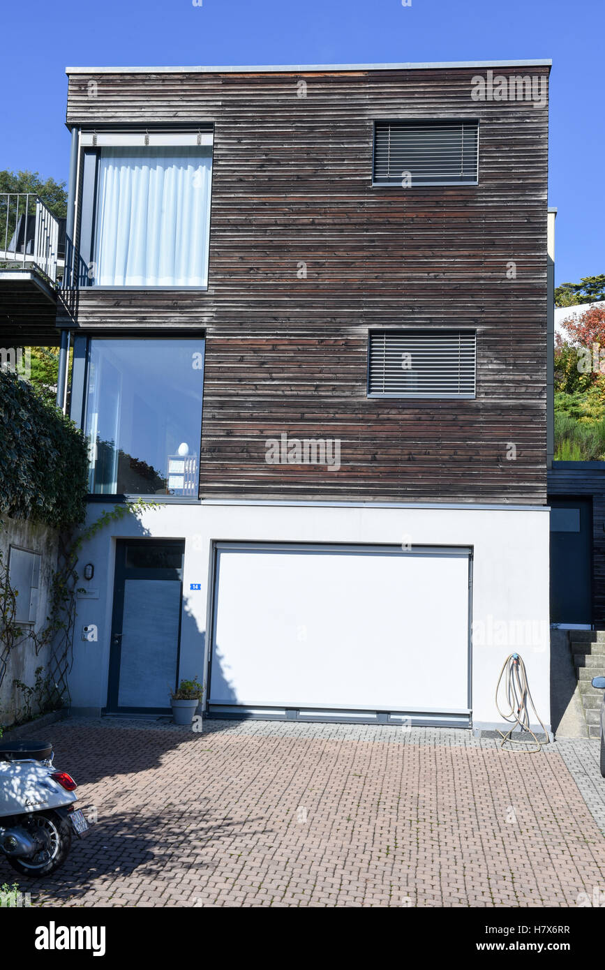 Beautiful modern house in cement and wood Stock Photo - Alamy