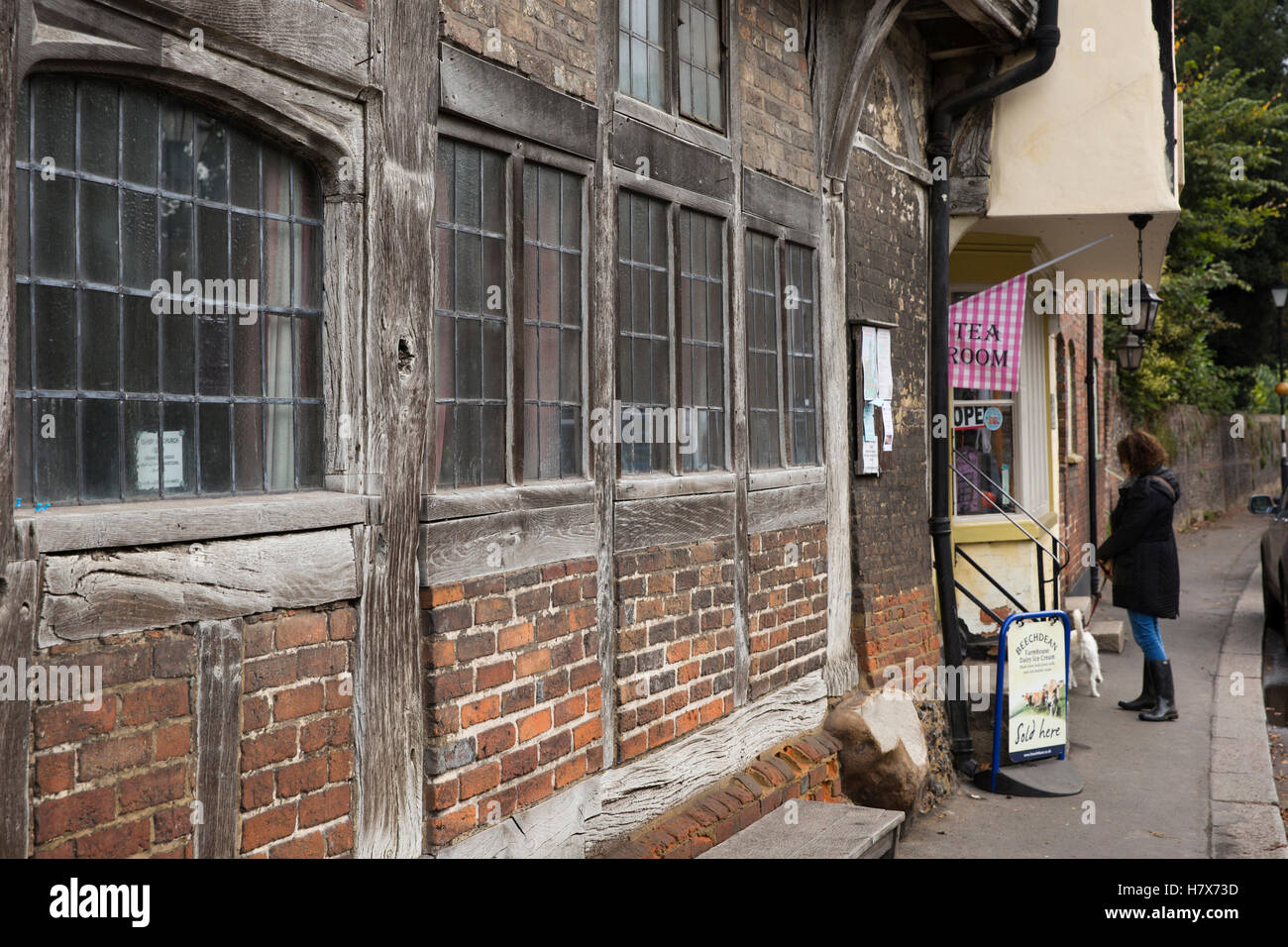 UK, England, Buckinghamshire, West Wycombe, High Street, timber framed windows of Church Loft, next to village sweet shop Stock Photo