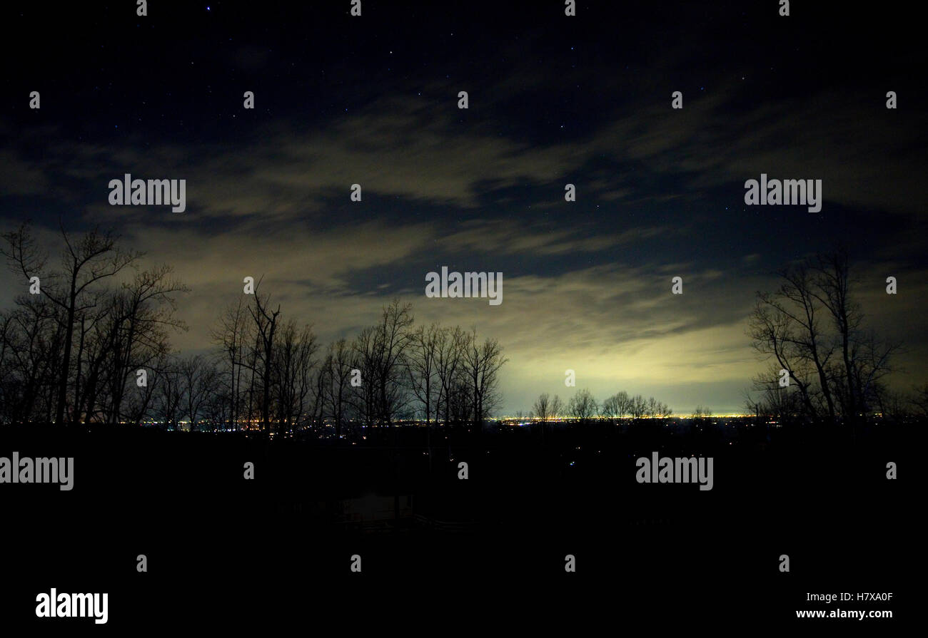 Stars coming from behind the clouds over Winchester Virginia Stock