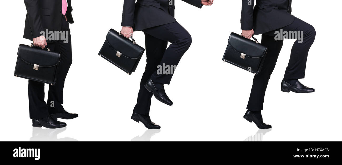 Businessman making steps Stock Photo