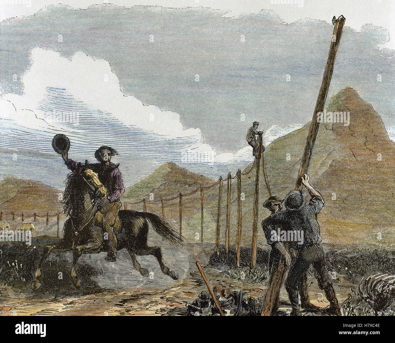 The United States. American West. 19th century. Telegraph installation. Workers installing new telegraph poles near Nebraska mountains. Colored engraving. Stock Photo