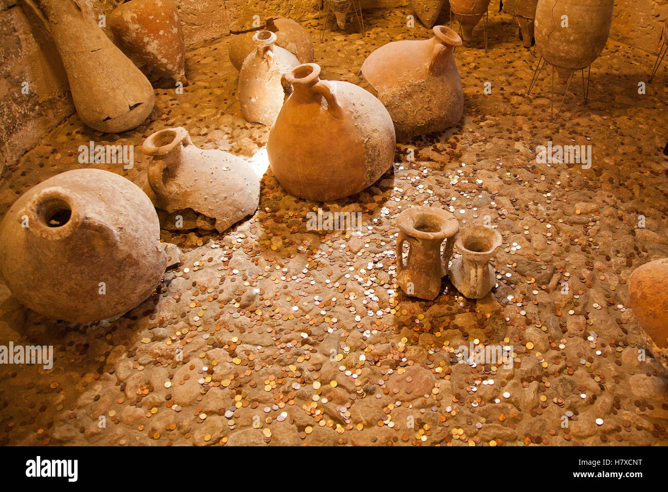 Old crocks. Ancient crocks and chatty in an old stone room with small windows. Stock Photo