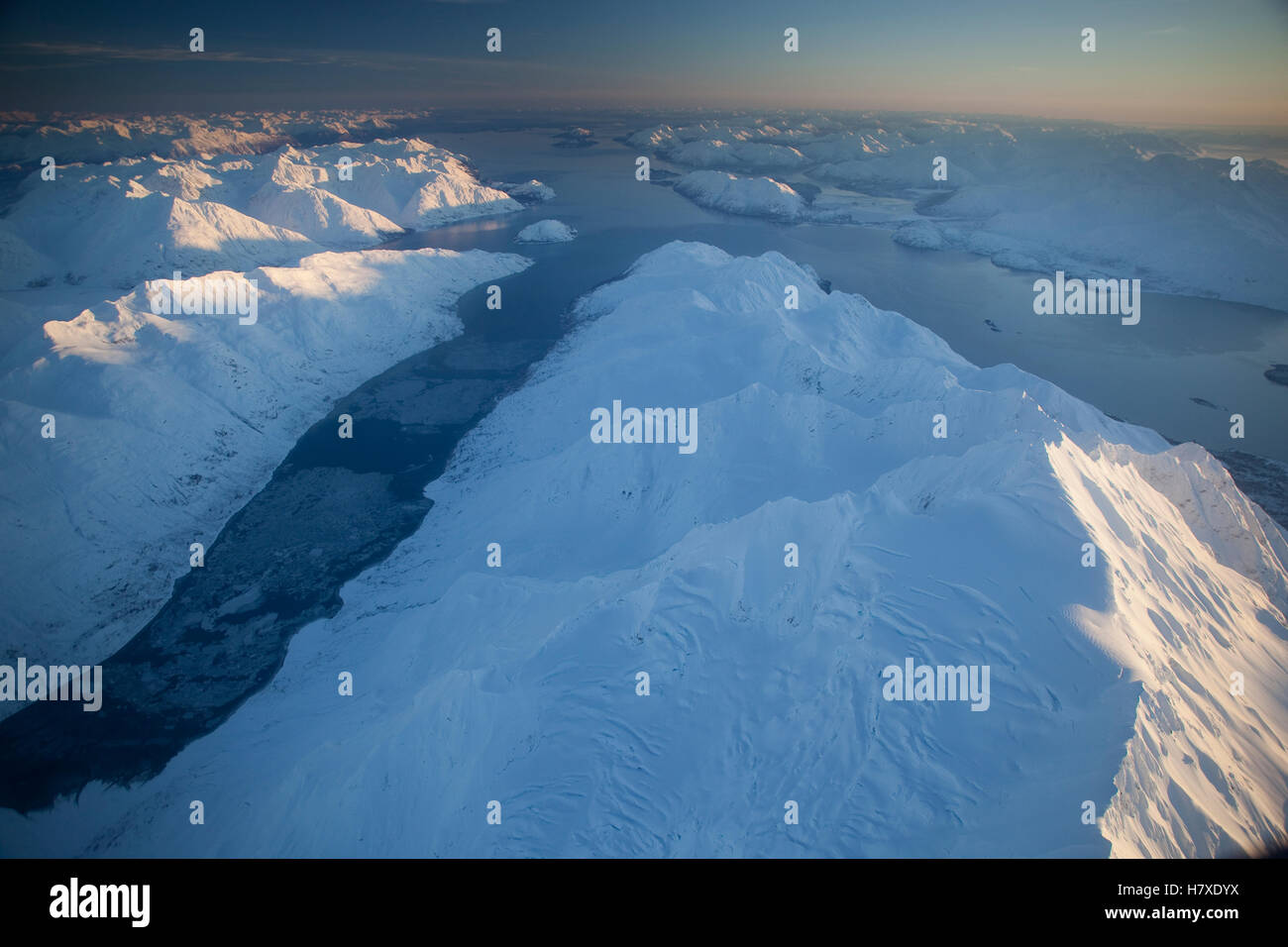 Rendu Inlet Late afternoon winter sun illuminating Mount Abdallah separating Tarr ...