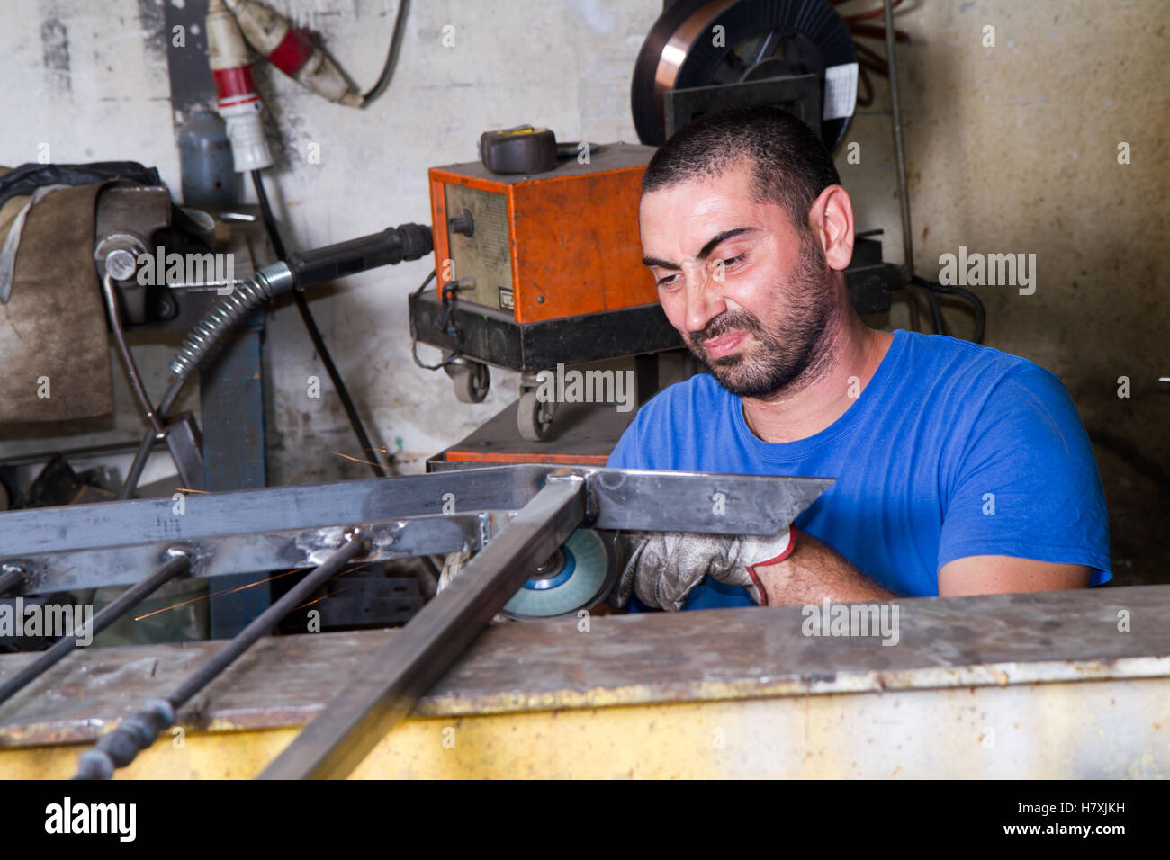 metalworker at work in his workshop Stock Photo - Alamy