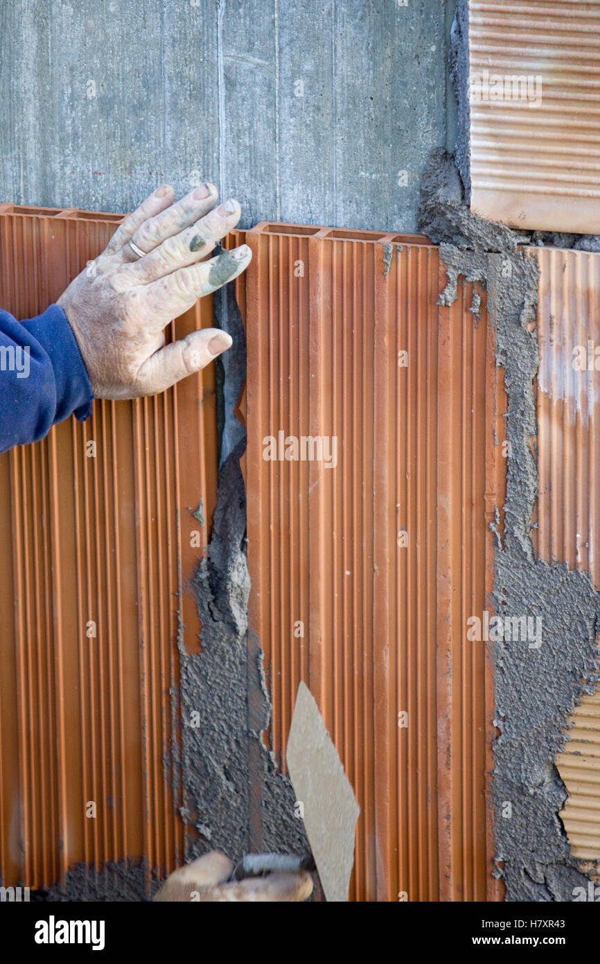 bricklayer at work in a site Stock Photo - Alamy