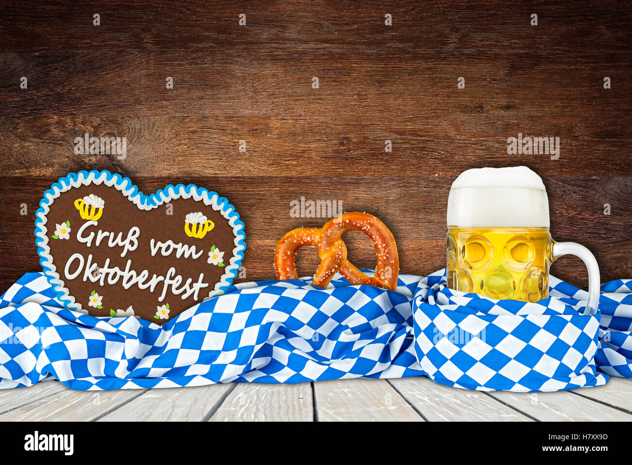 Oktoberfest background with beer mug bavarian flag and gingerbread heart Stock Photo