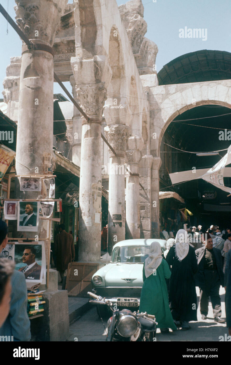 The entrance to the Al-Hamidiyah Souq with the ruins of the Jupitertemple in the syrian city of Damascus, Syria April 1963. | Stock Photo