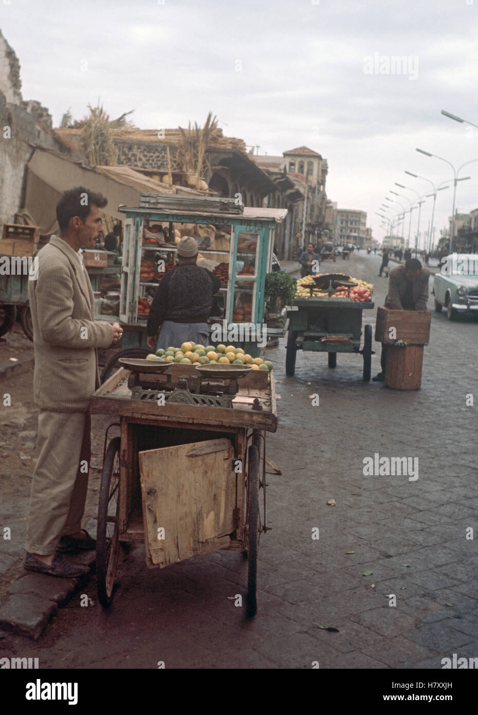 Street Vendors in the syrian city of Homs, Syria November 1963. | Stock Photo