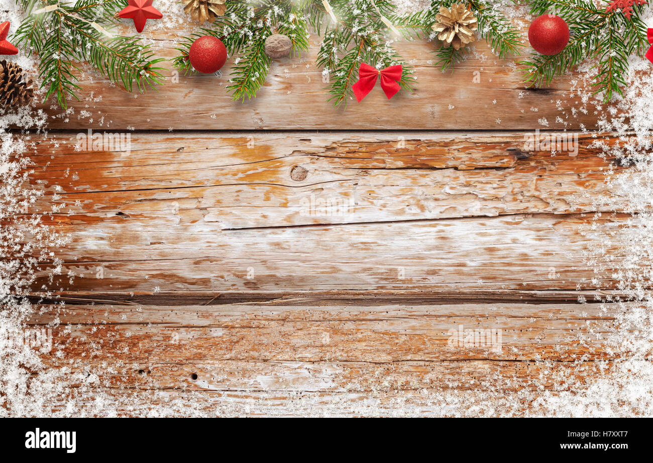 Christmas background image. wooden table with free space for text. Top view  of table. Christmas tree and decorations beside Stock Photo - Alamy