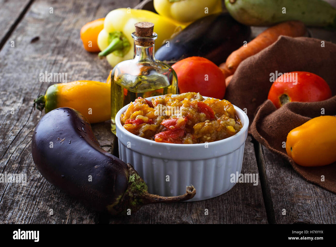 Eggplant caviar in ceramic bowl. Selective focus Stock Photo