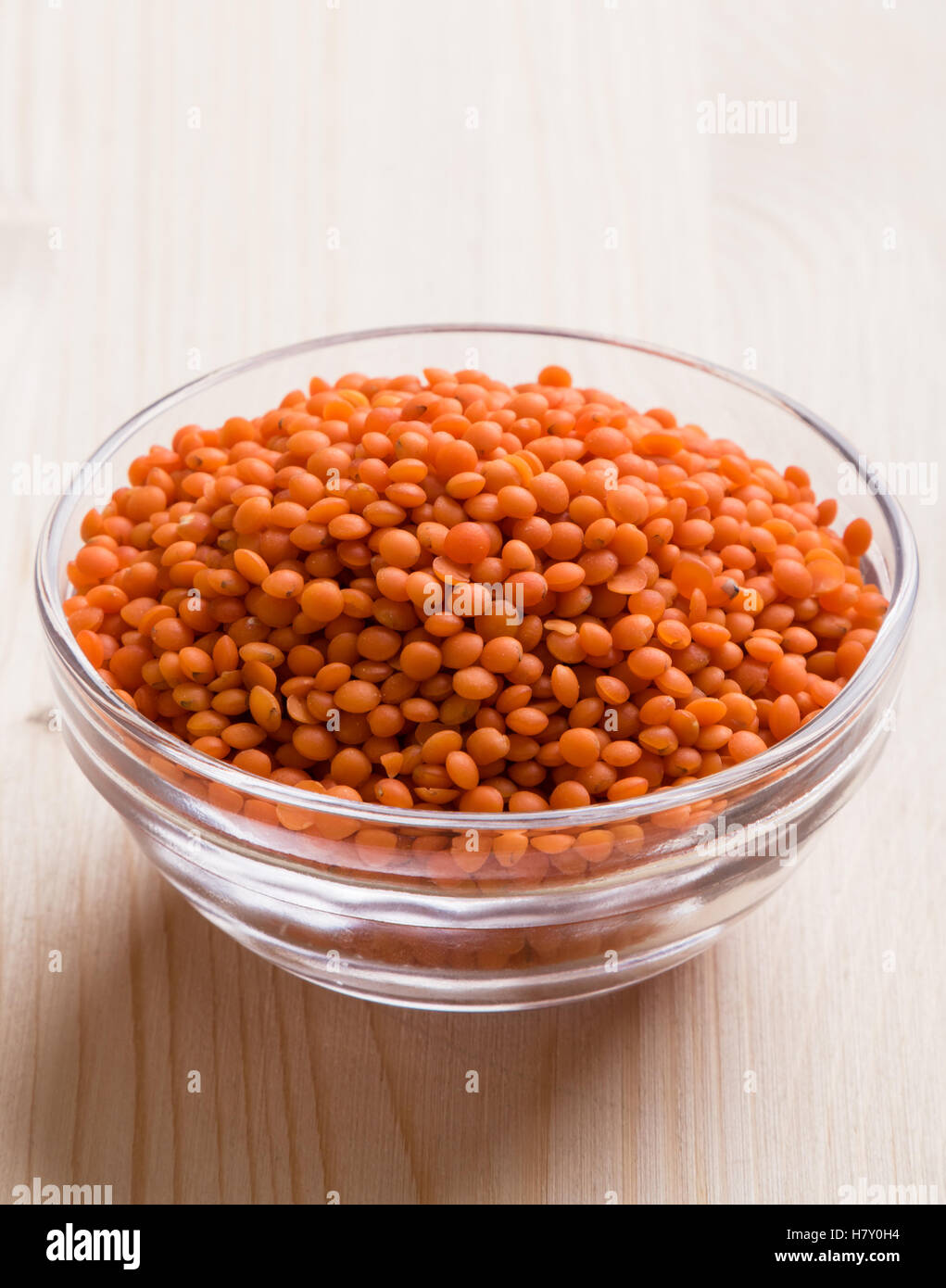 natural organic dry red lentils in glass bowl Stock Photo - Alamy