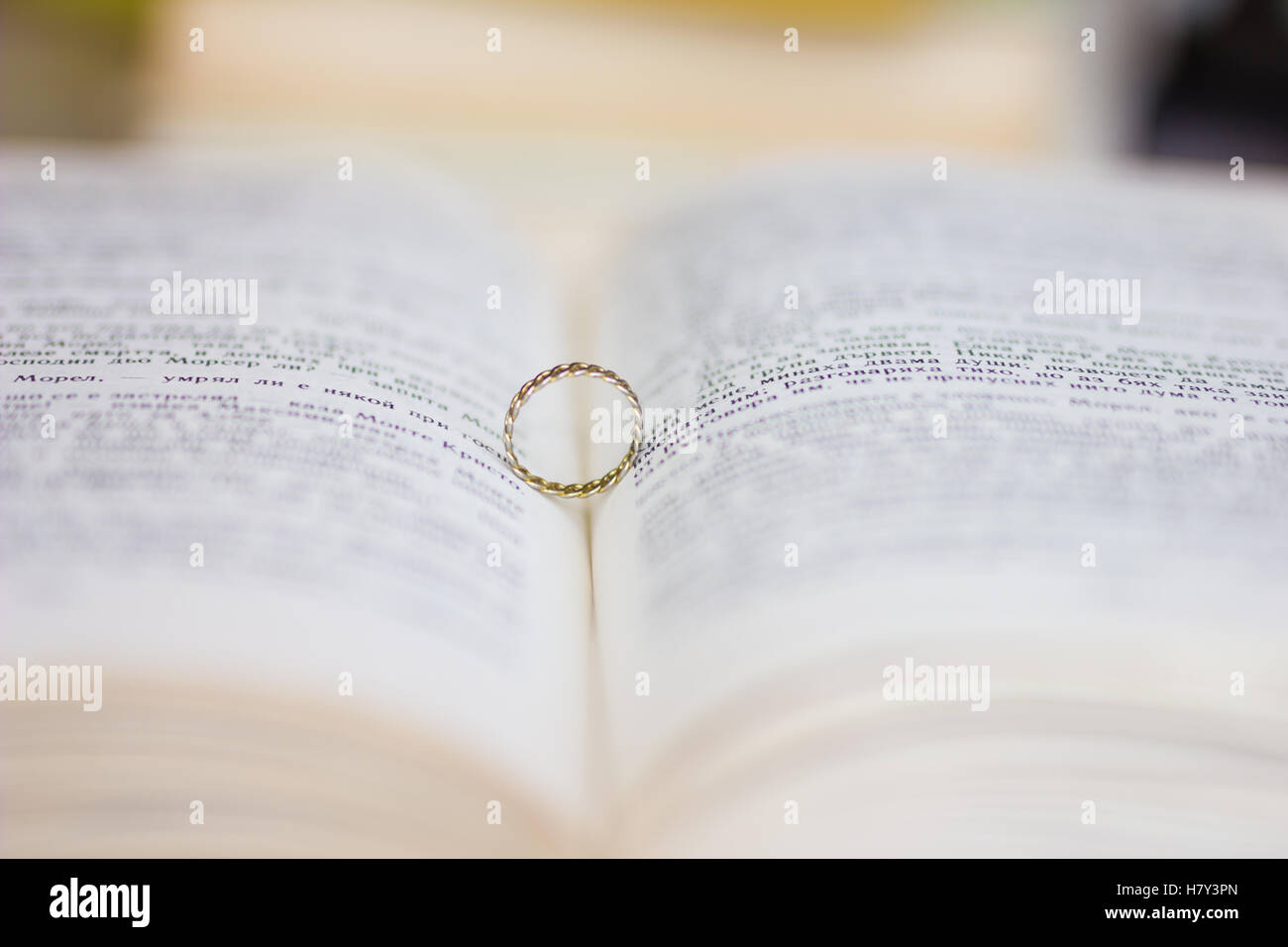 A wedding ring in the bible Stock Photo Alamy
