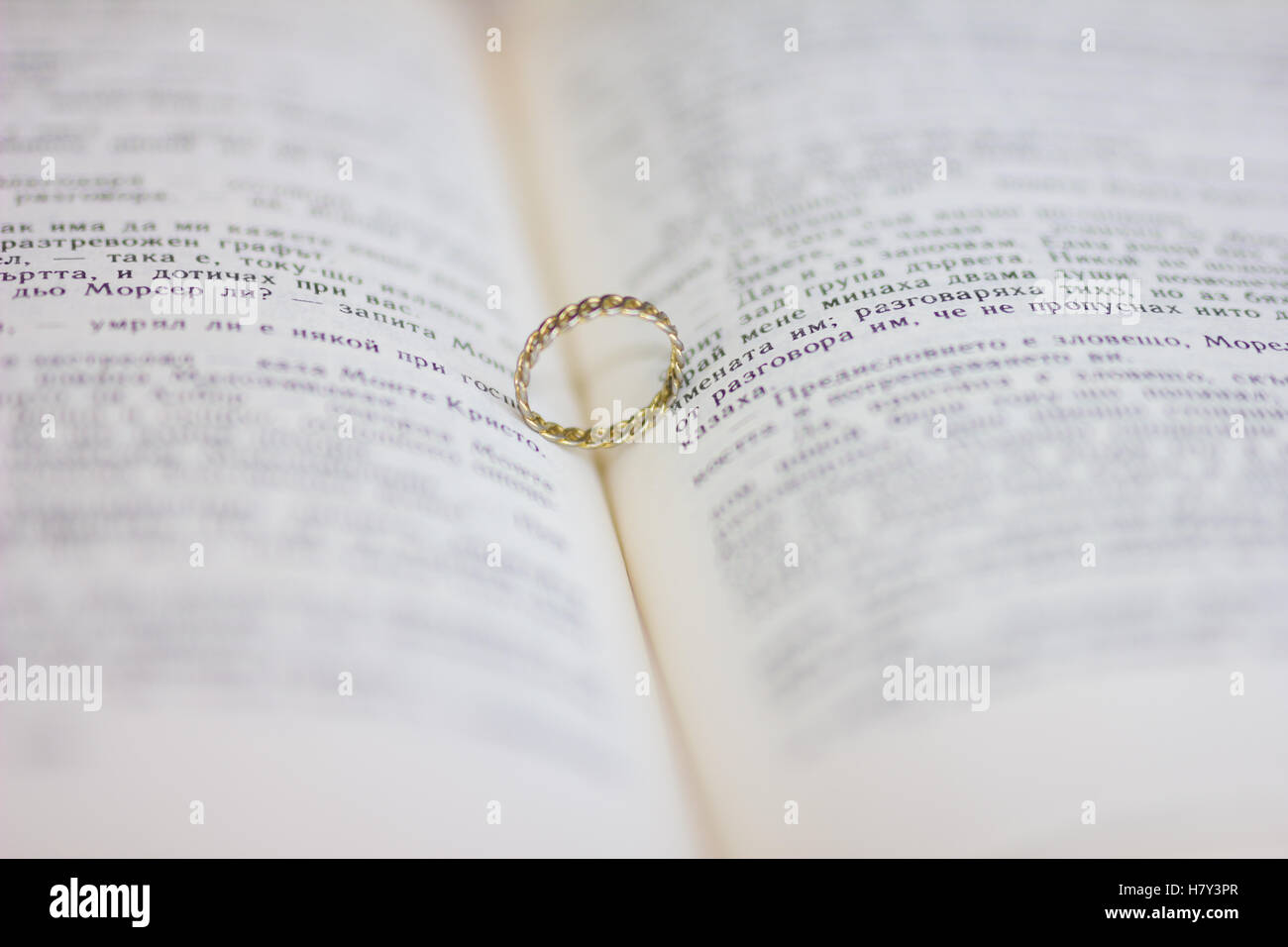 A wedding ring in the bible Stock Photo Alamy