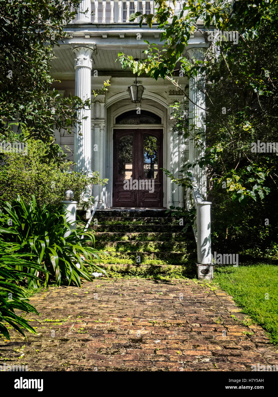Old abandon house entrance on St. Charles Ave New Orleans Stock Photo