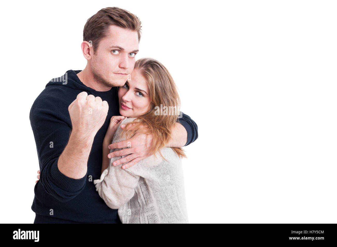 Man defending his woman showing fist like having a fight isolated on white background with copy text space Stock Photo