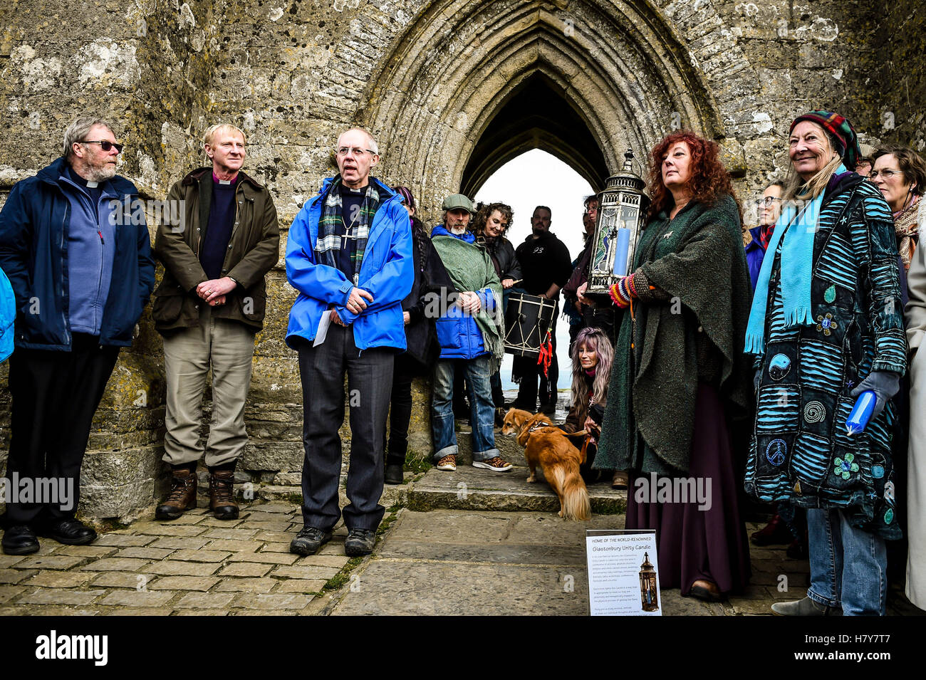 The Archbishop of Canterbury, the Most Rev Justin Welby leads prayers by St Michael's Tower atop Glastonbury Tor accompanied by local clergy, parishoners and people of other faith and spiritual groups during his visit to the Somerset area. Stock Photo