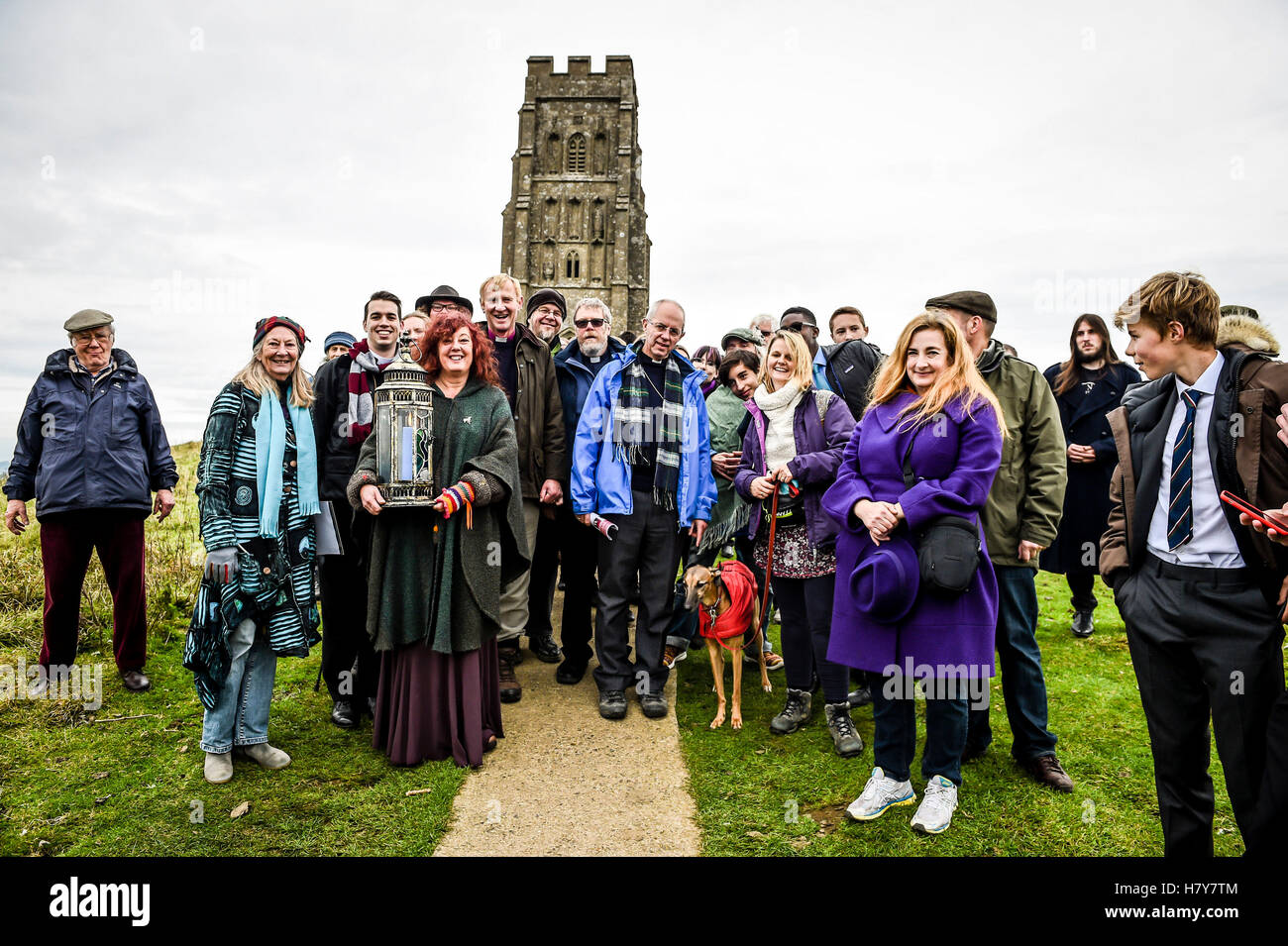 The Archbishop of Canterbury, the Most Rev Justin Welby descends the 301 steps at Glastonbury Tor accompanied by local clergy, parishoners and people of other faith and spiritual groups during his visit to the Somerset area. Stock Photo