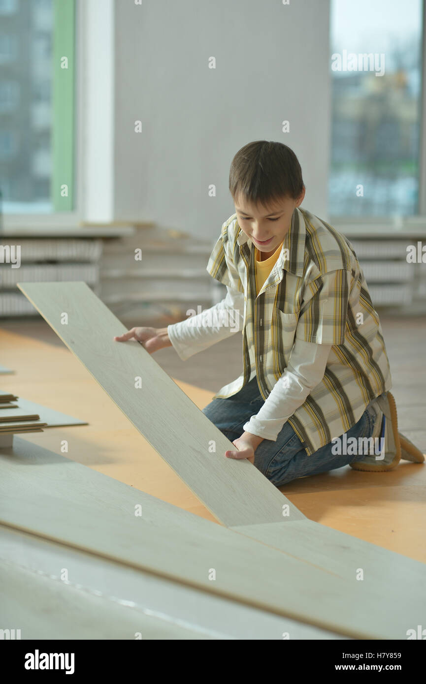 Boy repairing hi-res stock photography and images - Alamy
