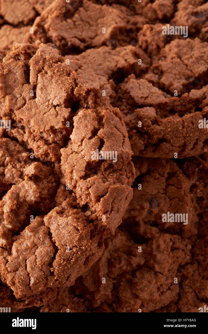 Backgrounds and textures group of dark chocolate cookies, arranged as