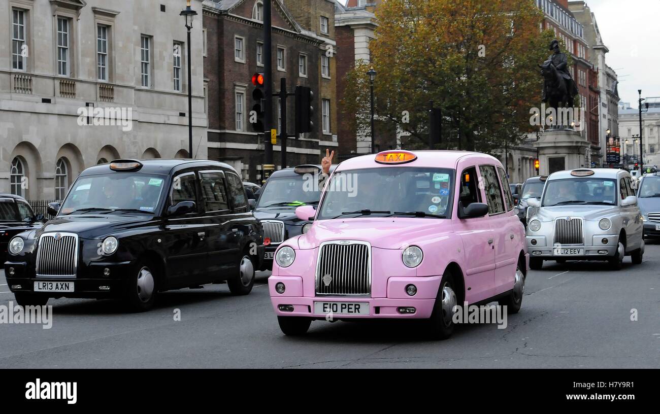 A driver gesticulates as black cab drivers hold a protest in Whitehall, London, to call for an inquiry into transport for London (TfL) over congestion and air pollution. Stock Photo