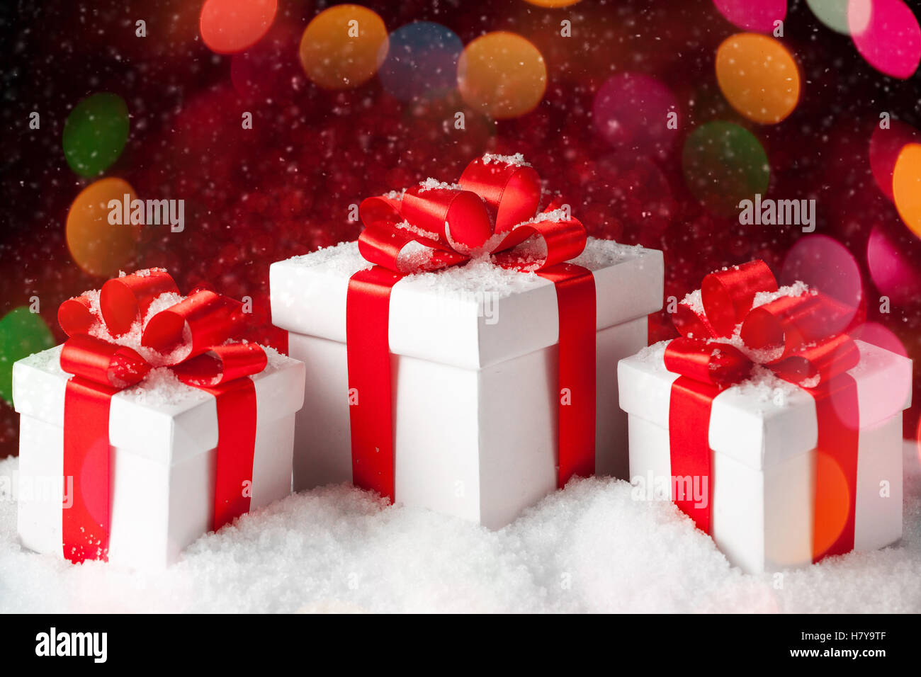 Christmas gift boxes with a large red bow Stock Photo