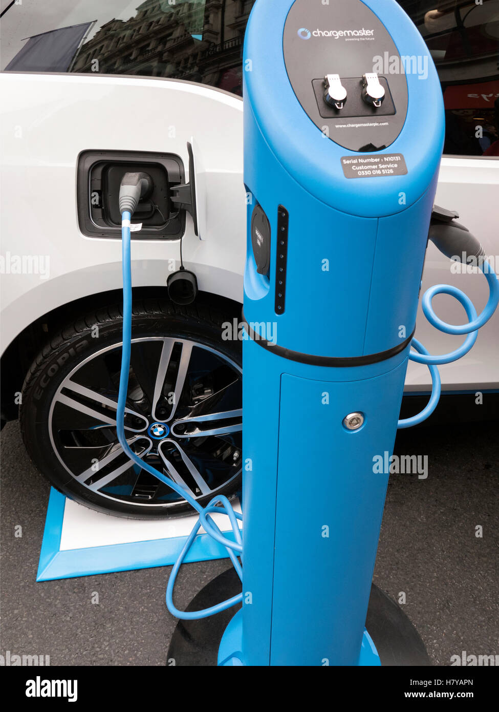 BMW i3 Electric car on a chargemaster street charger. Stock Photo