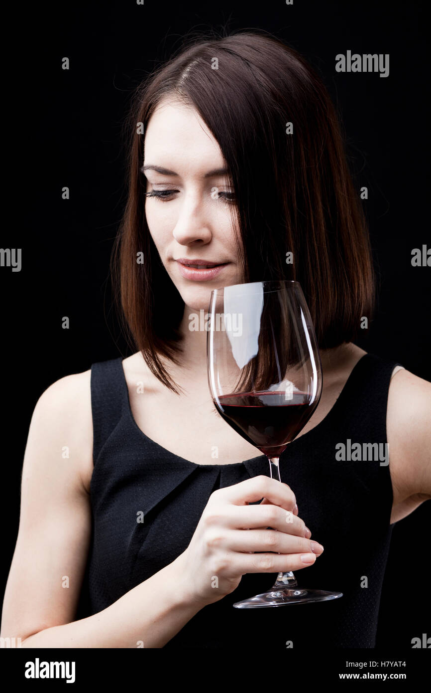 woman holding wine glass Stock Photo - Alamy