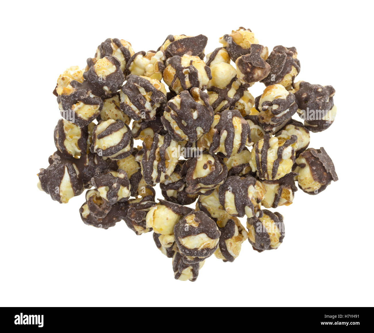Top view of a serving of fudge drizzled popcorn isolated on a white background. Stock Photo