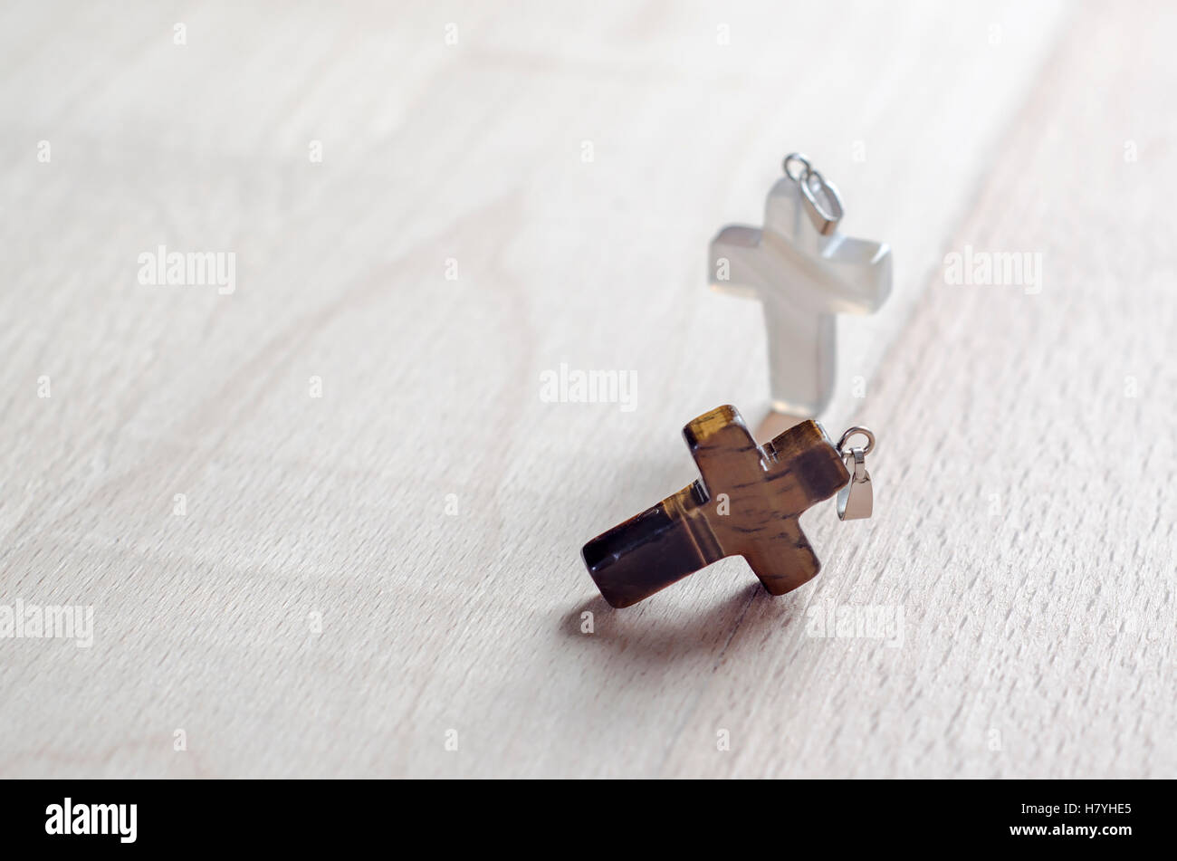 Cross on wooden background, close up Stock Photo