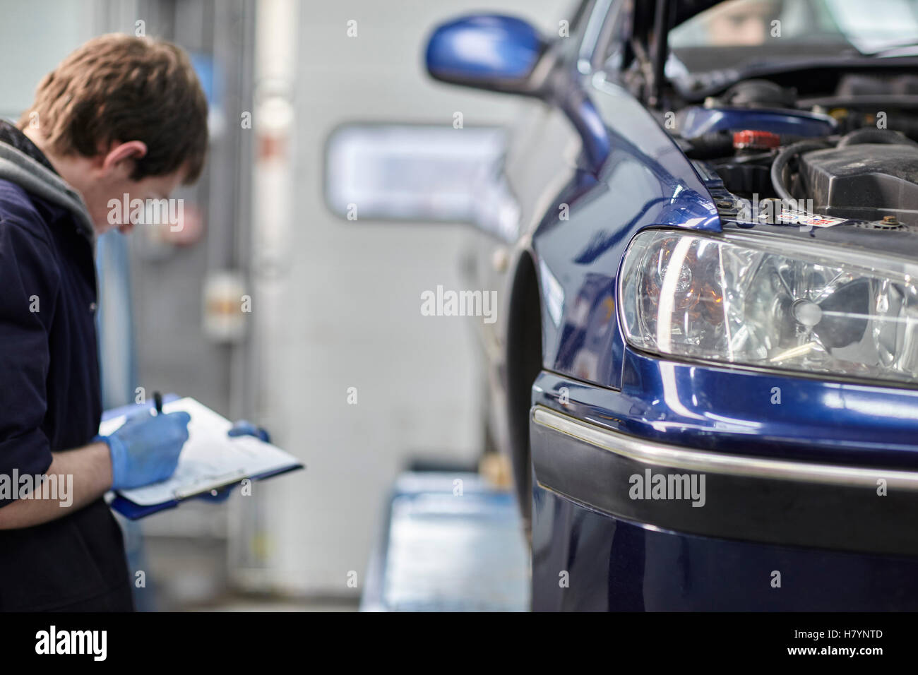 Car Servicing Mechanic MOT Motor Vehicle Engineer Testing Stock Photo