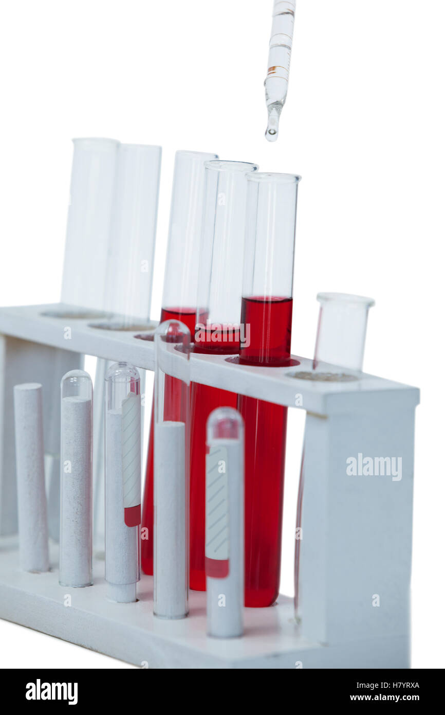 Close-up of test tube rack with test tubes Stock Photo