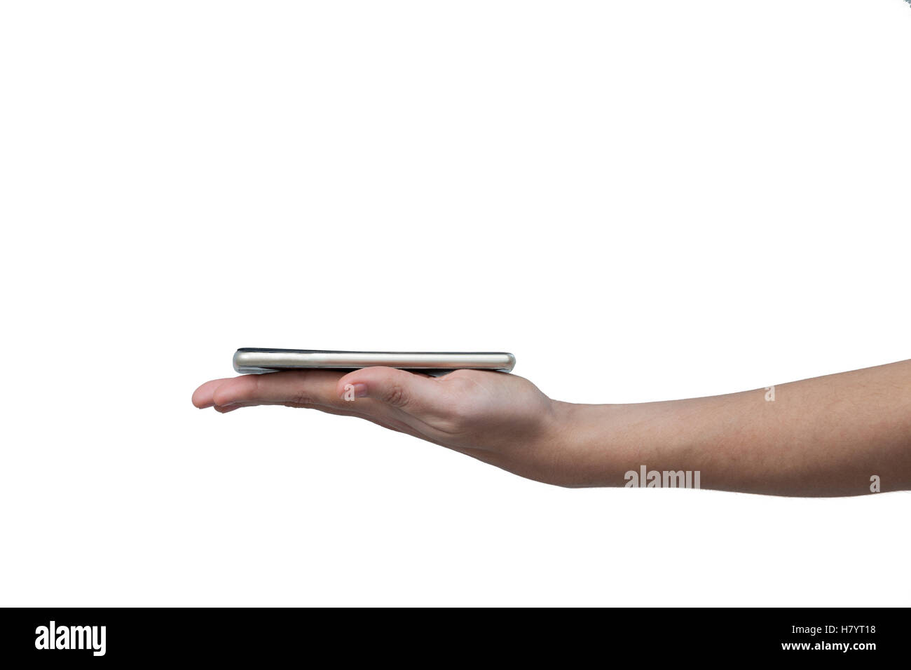 Hand holding mobile phone against white background Stock Photo - Alamy