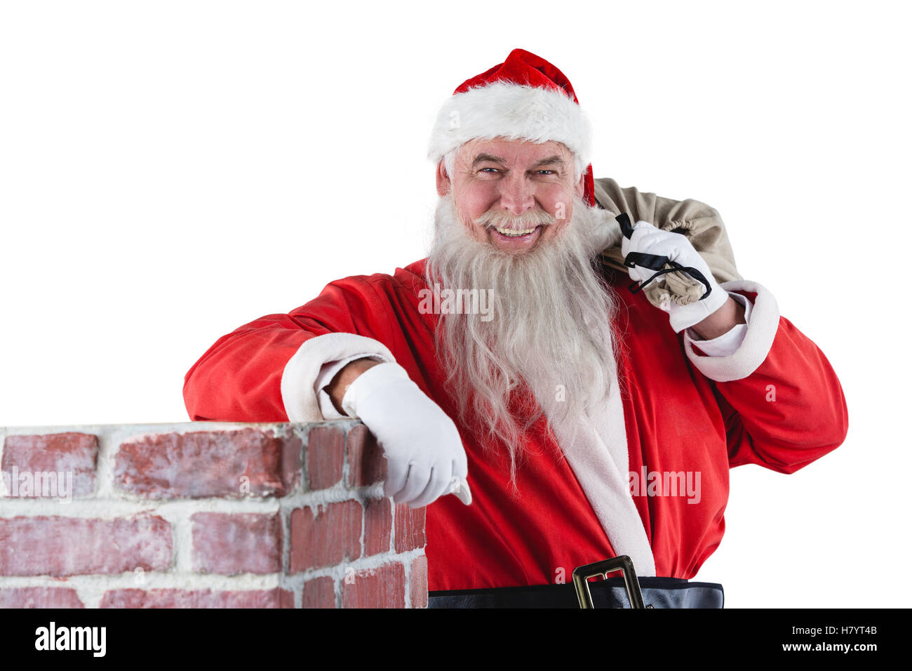 Portrait of santa Claus carrying bag full of gifts Stock Photo - Alamy