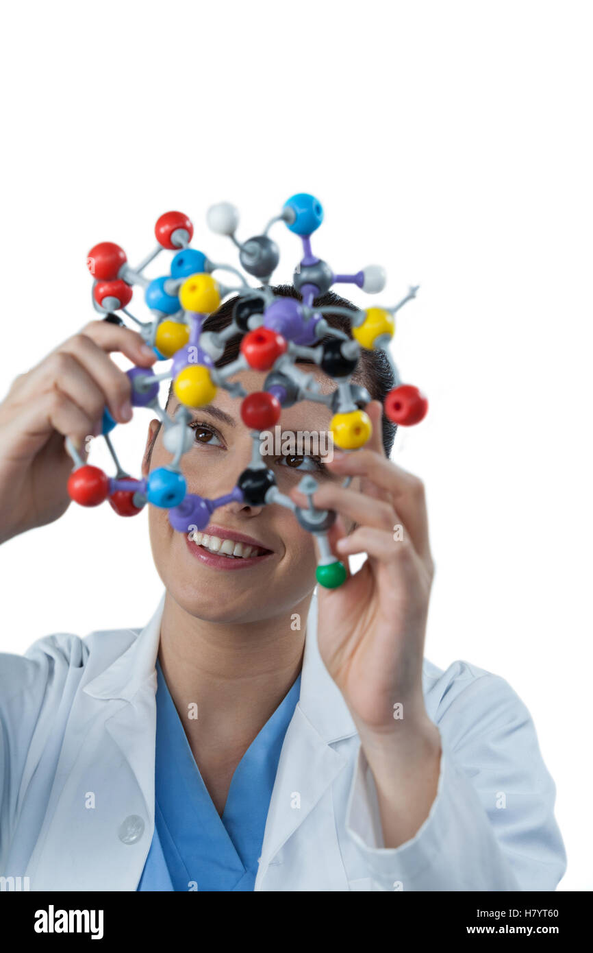 Female scientist holding molecular model Stock Photo