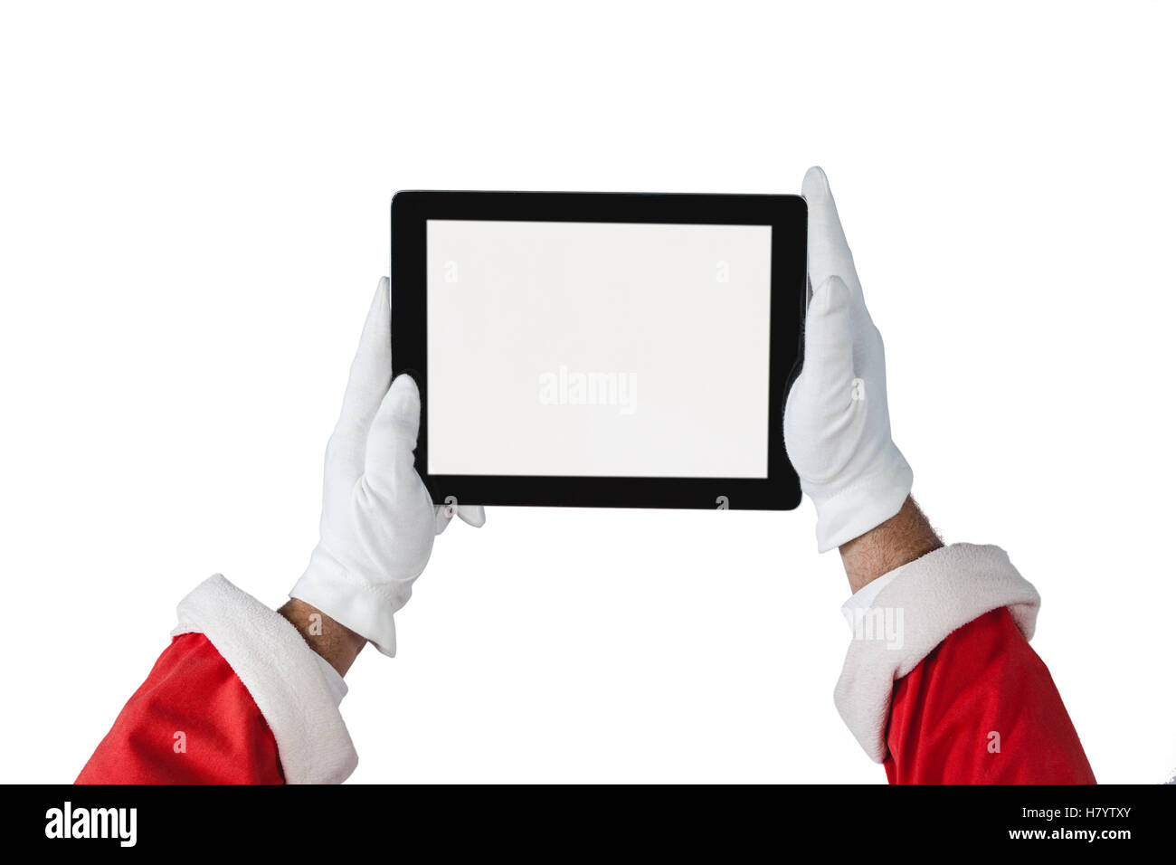 Santa claus holding digital tablet on white background Stock Photo - Alamy