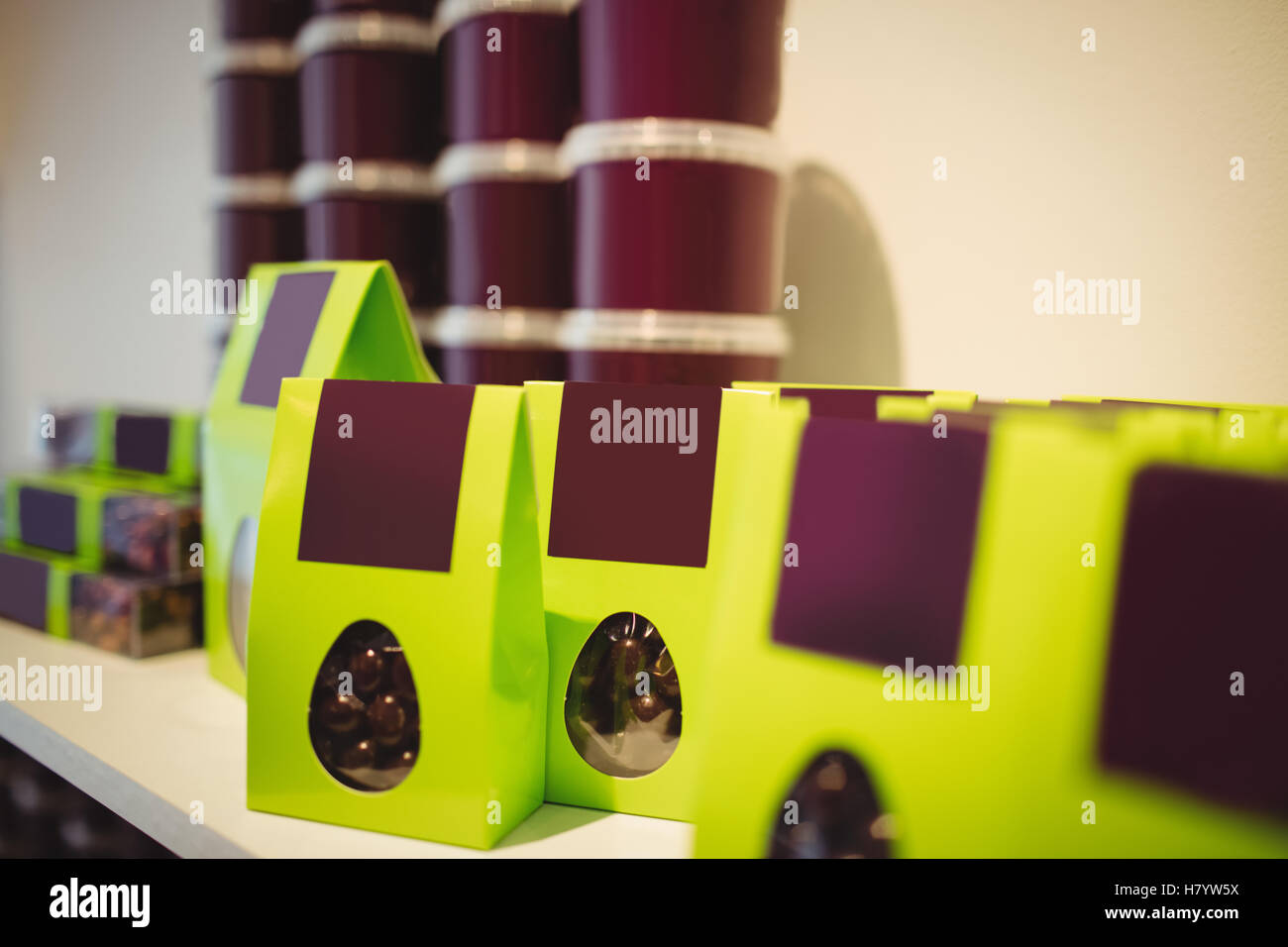 Packed chocolates in green box in display Stock Photo