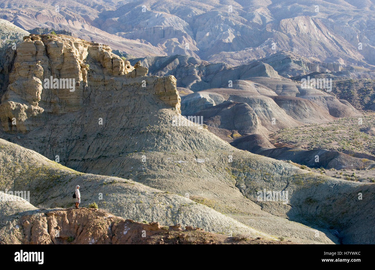 Hiker in Rainbow Basin Natural Area, Mojave Desert, California Stock