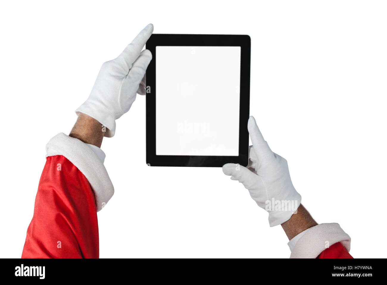 Santa claus holding digital tablet Stock Photo