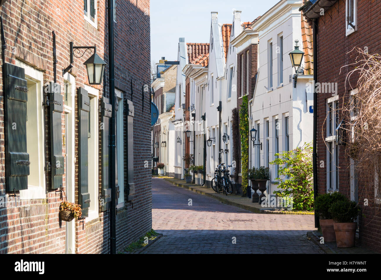 Streetscene of narrow street in old town of Naarden, North Holland, Netherlands Stock Photo