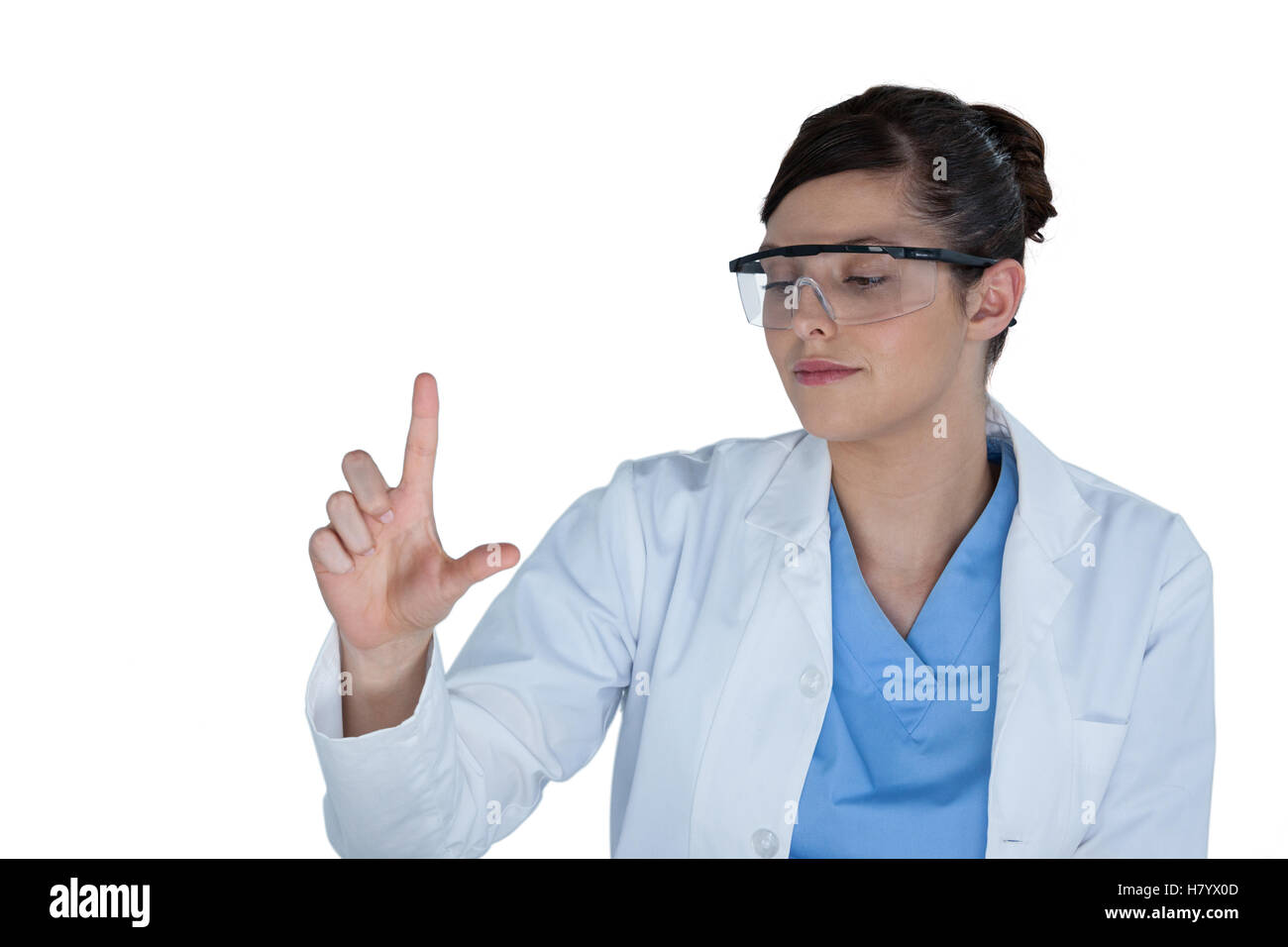 Female scientist conducting an experiment Stock Photo