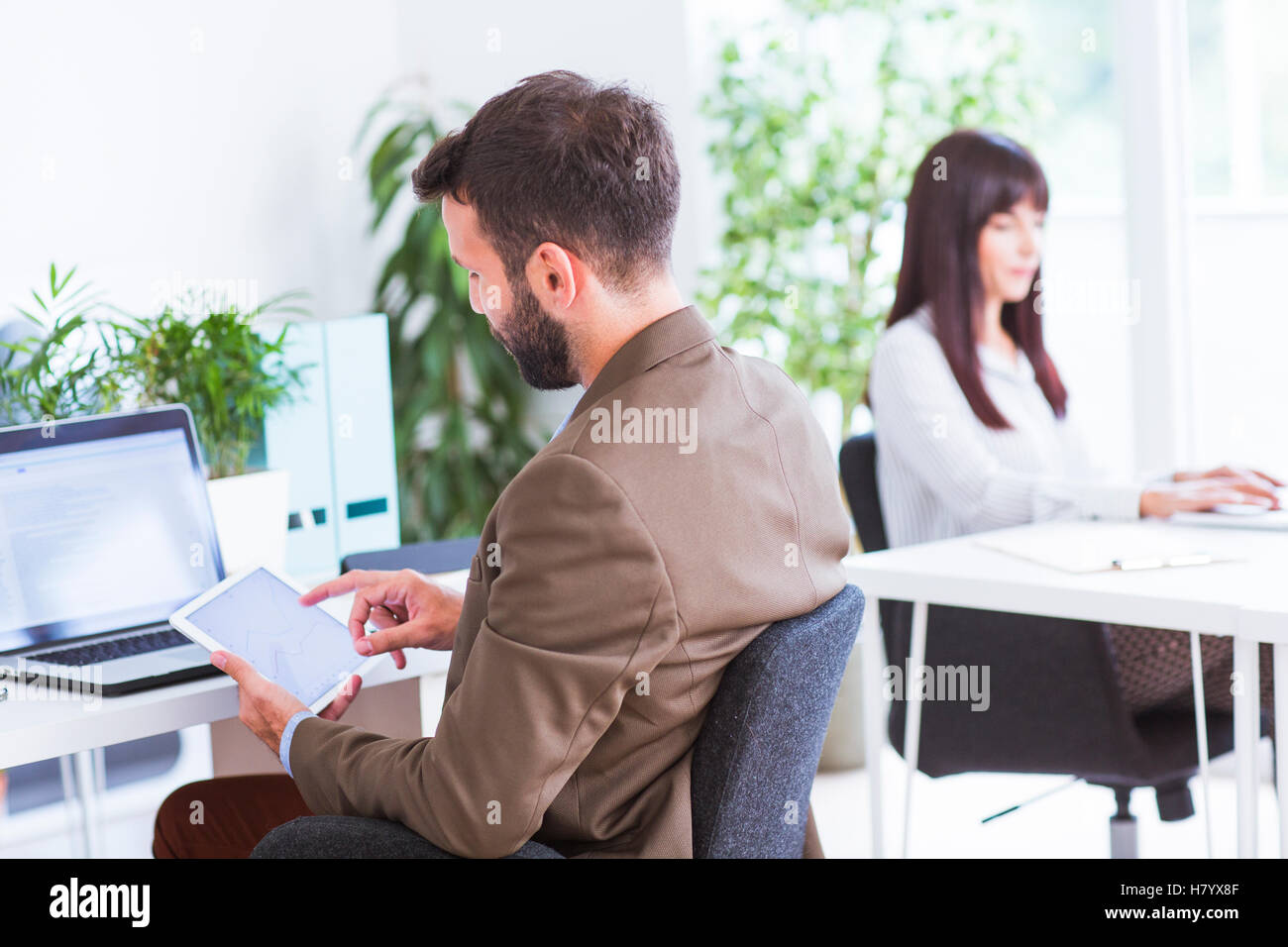 Man working in office Stock Photo
