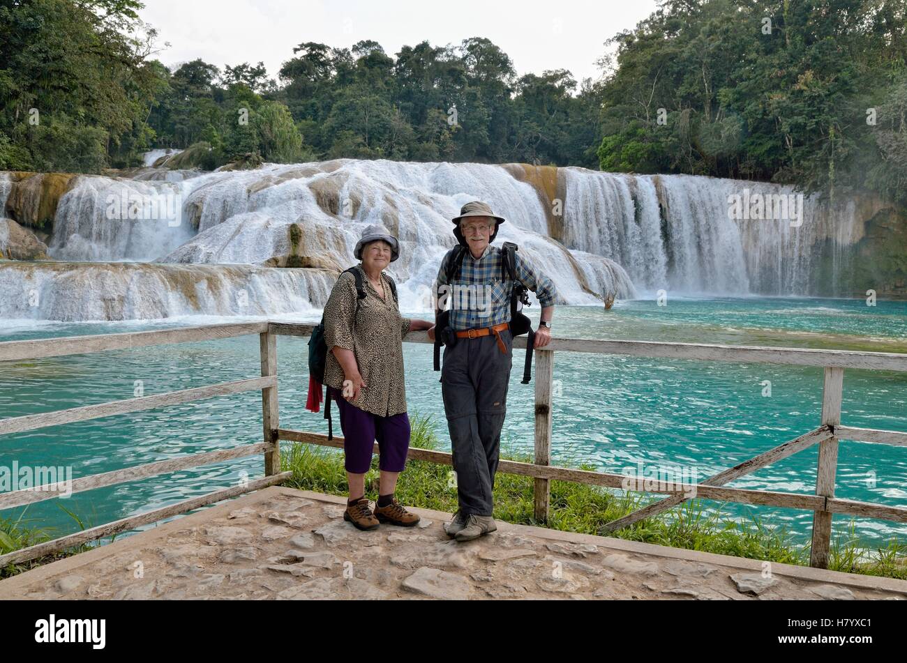 Tourists are standing at the Agua Azul blue water waterfalls, Palenque, Chiapas, Mexico Stock Photo
