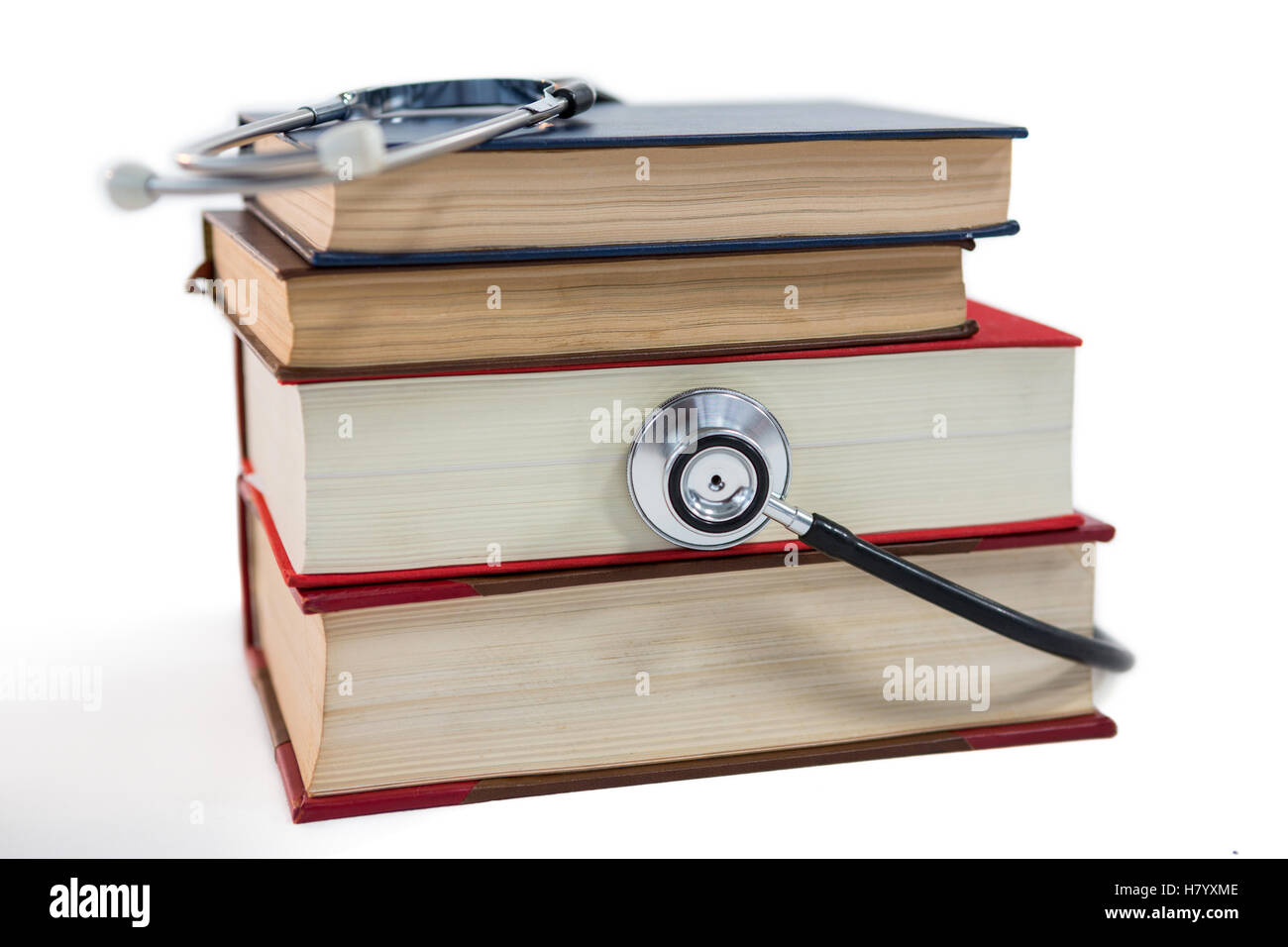 Stethoscope on stack of book Stock Photo - Alamy