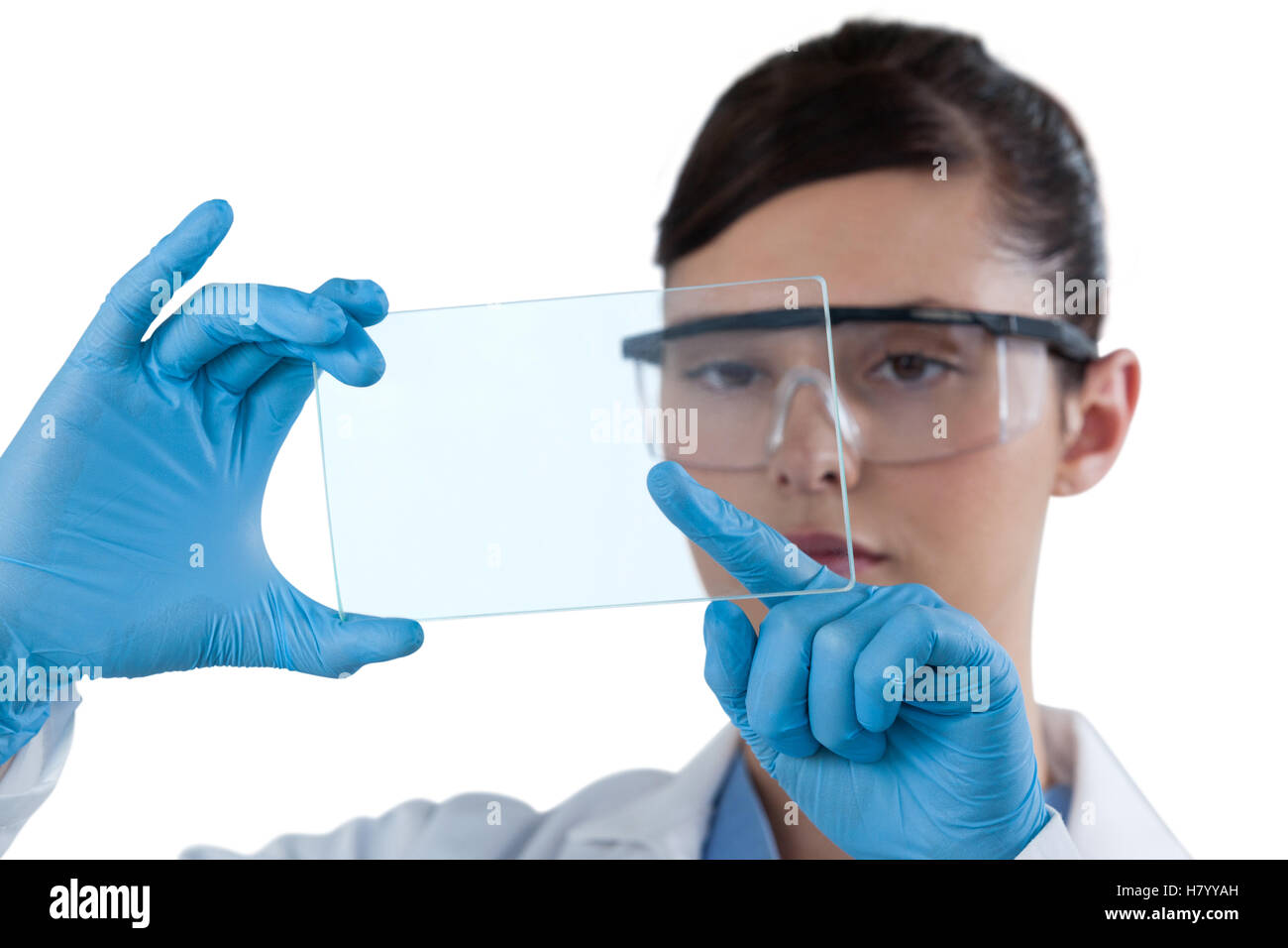 Female scientist using mobile phone Stock Photo