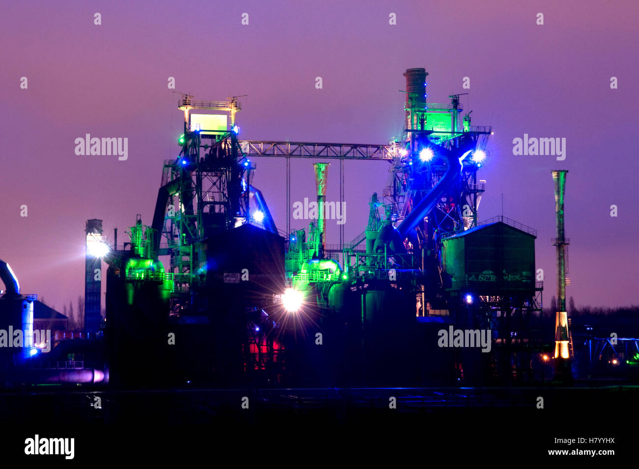 Colored lights illuminating the former smelting works in the Landschaftspark Duisburg Nord landscape park, Ruhrgebiet area Stock Photo