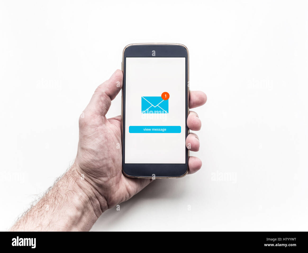 Close up of smartphone with Email app interface on screen holding in man's hand. Stock Photo
