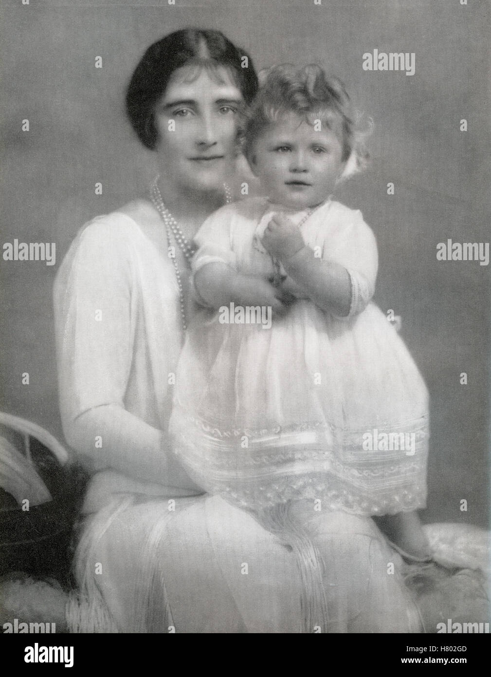 Elizabeth Bowes-Lyon, future Queen Elizabeth, with her daughter Princess Elizabeth, future Queen Elizabeth II, in 1927.  Elizabeth Angela Marguerite Bowes-Lyon, 1900 –2002.  Wife of King George VI and the mother of Queen Elizabeth II.  Elizabeth II, 1926 - 2022. Queen of the United Kingdom, Canada, Australia and New Zealand. Stock Photo